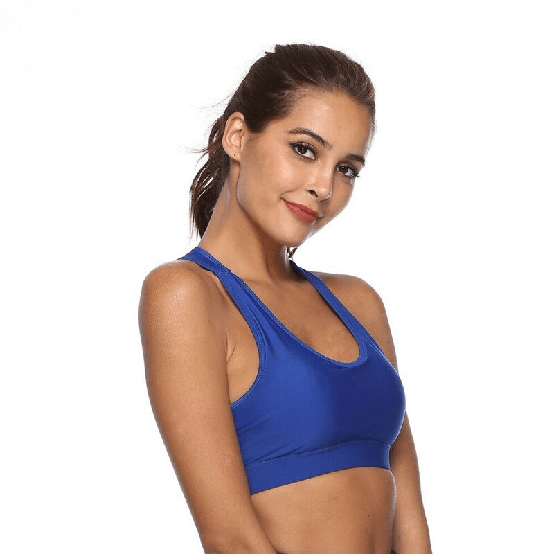 Woman wearing a blue stylish elastic sports bra with back pocket, ideal for female fitness athletes seeking comfort and performance.